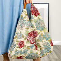Wzorzysta torebka worek boho style Sterpoa print kwiaty beżowa